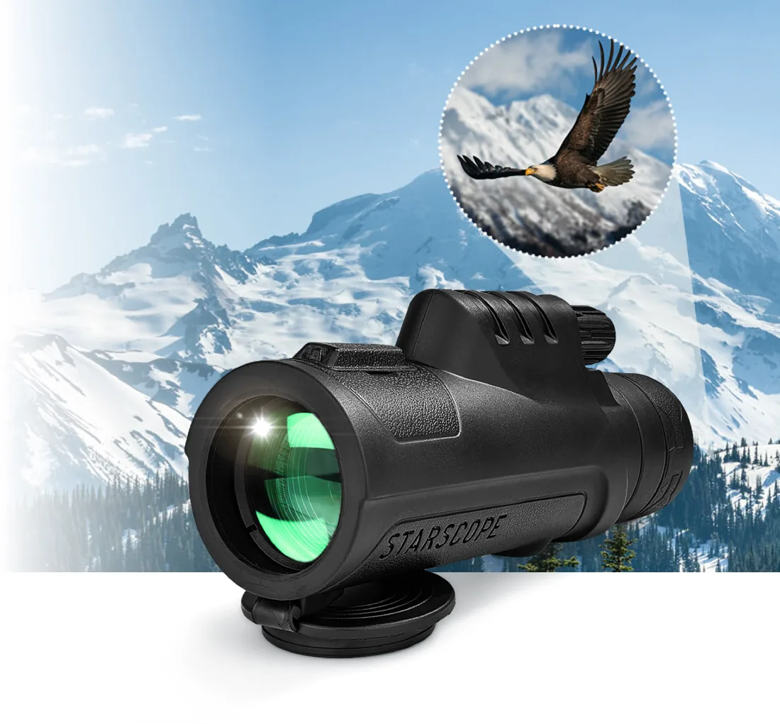Starscope V3 monocular in front of a snowy mountain with an eagle seen through the lens